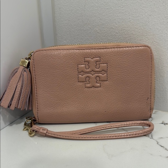 Tory Burch Accessories - Tory Burch Pink Clutch with Tassel and Wrist Strap